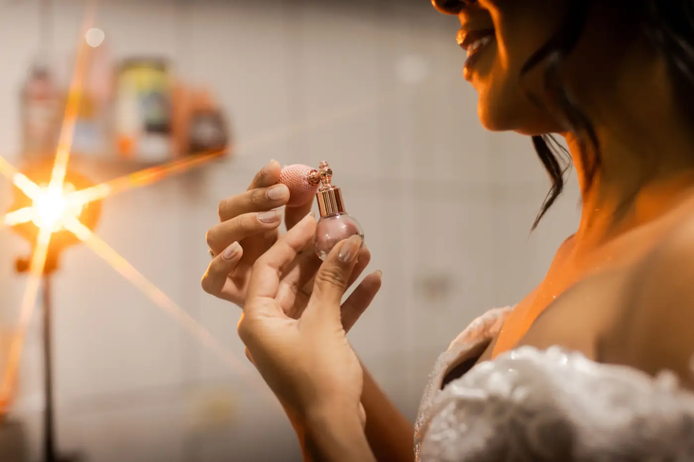 A shopper holding a small cosmetics bottle up to the light